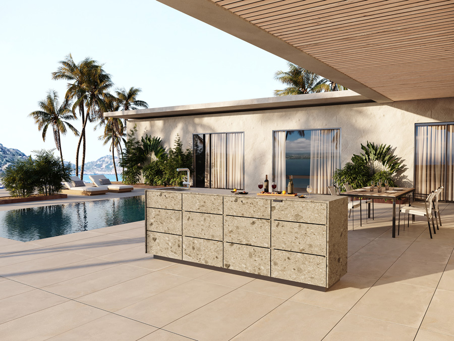 Seitz Garten- und Landschaftsbau - Cubic Outdoorküche steht auf der Terrasse in der Nähe des Pools.